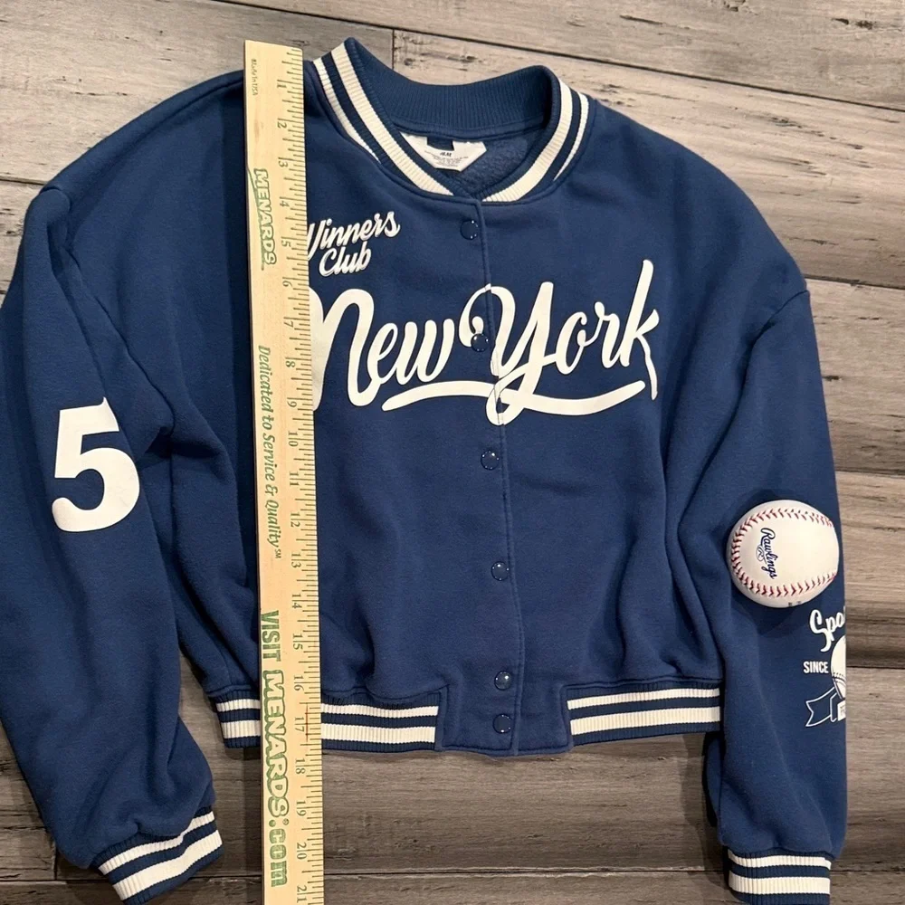 H&M Blue New York Varsity Jacket with White Lettering, includes the Cubs ball.